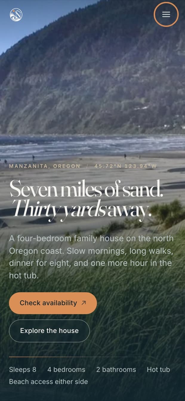 The live Nostos homepage on a phone, with the headline over a vertical crop of the beach photograph.