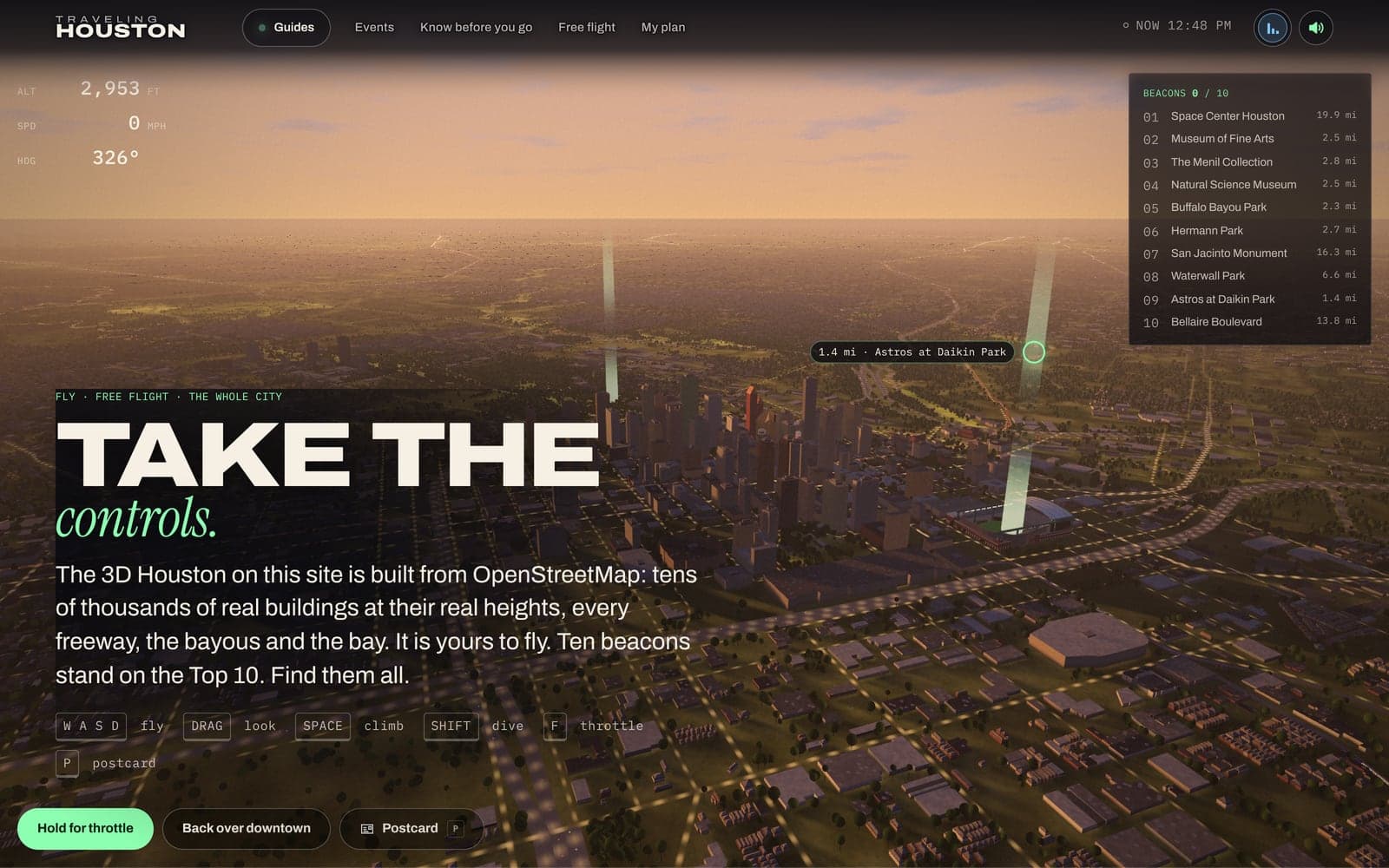 Free flight over the 3D city, with the flight controls listed on screen.